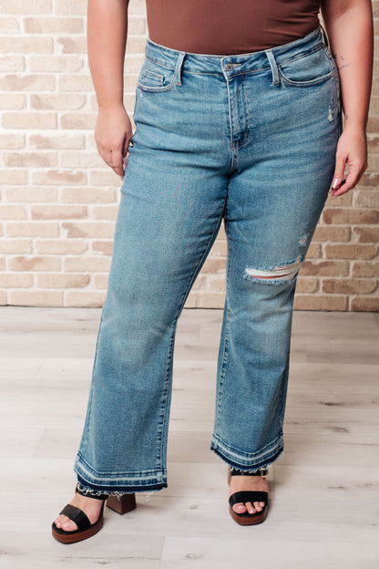 Isla Mid Rise Distressed Released Hem Bootcut Jeans - Southern Divas Boutique