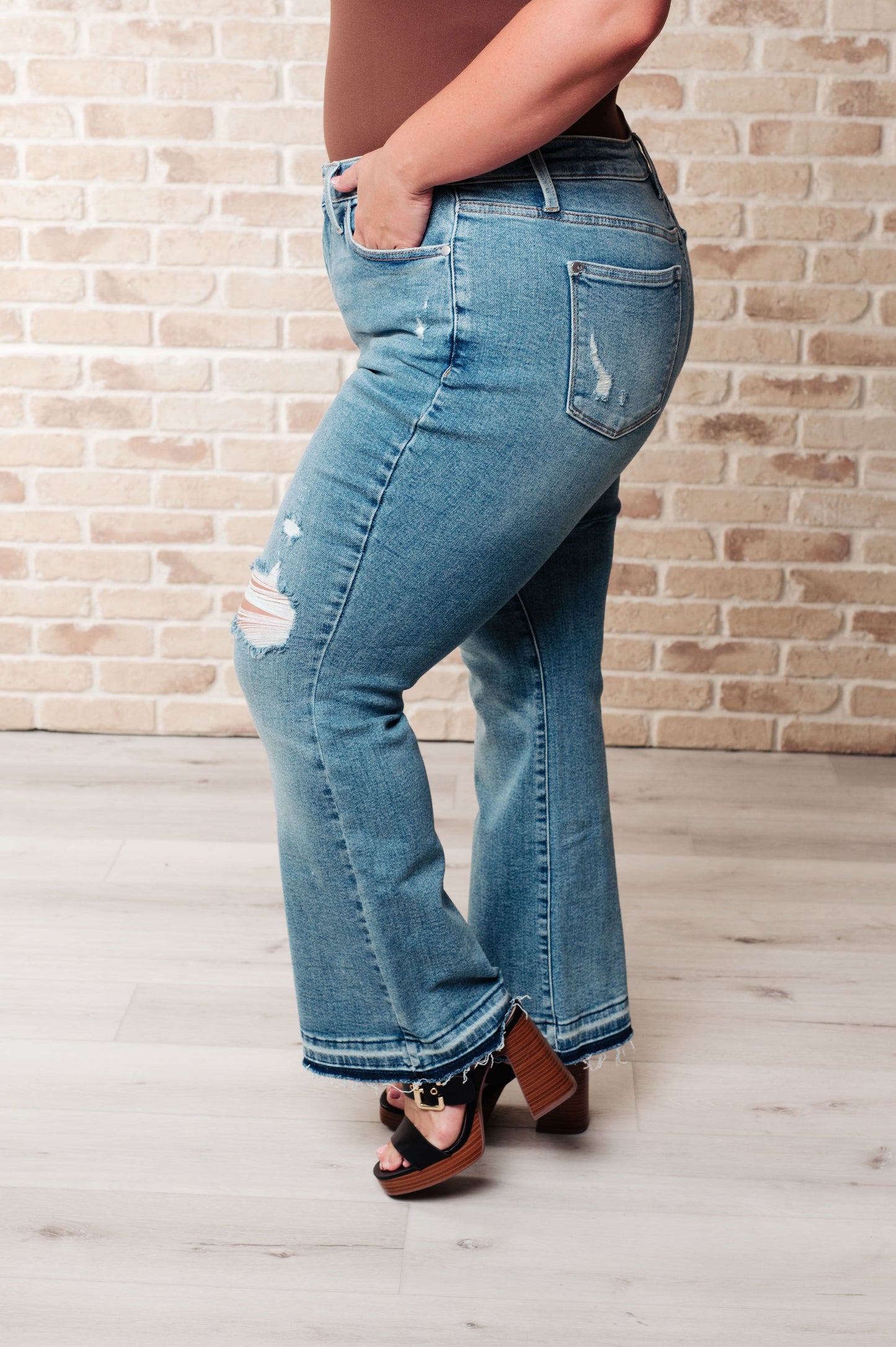 Isla Mid Rise Distressed Released Hem Bootcut Jeans - Southern Divas Boutique