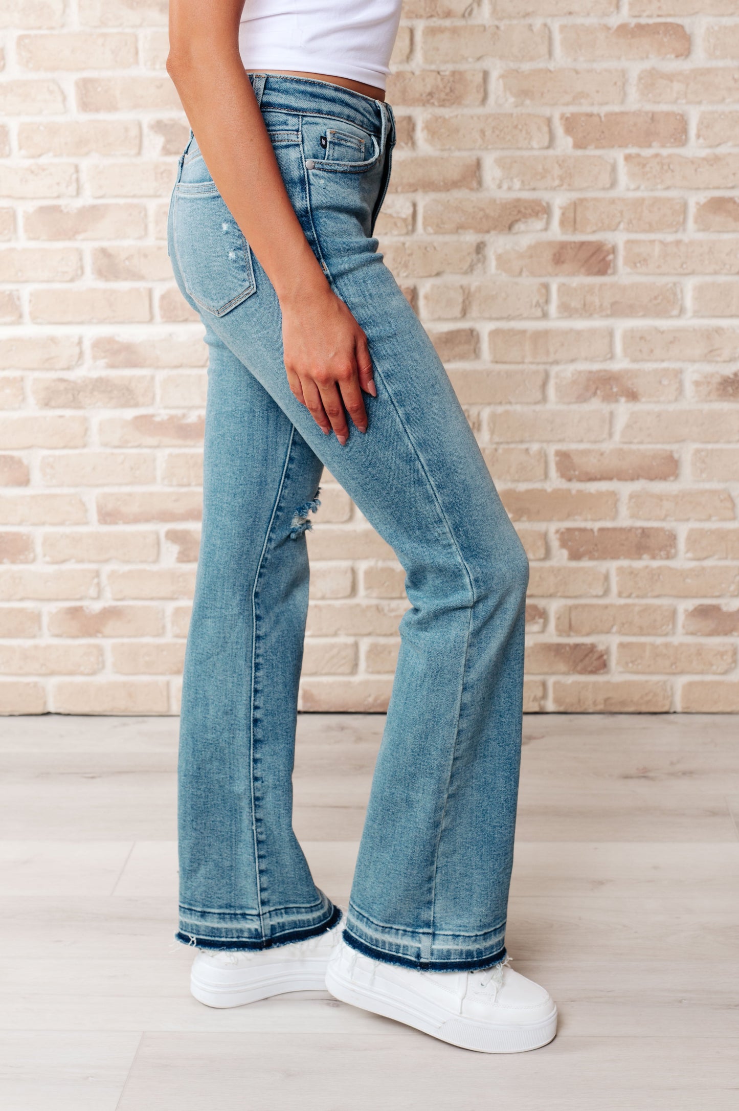 Isla Mid Rise Distressed Released Hem Bootcut Jeans - Southern Divas Boutique